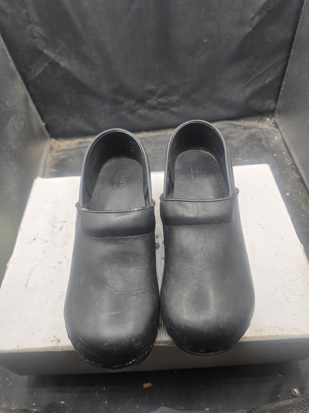 Dansko Black Leather Slip-On Clogs